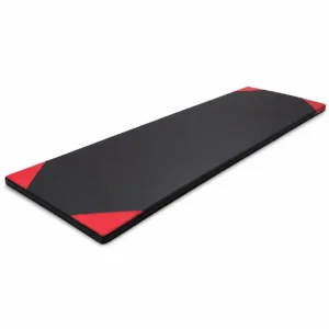 Colchoneta para ejercicio de 150 × 50 cm negra con cuatro esquinas rojas sobre fondo blanco